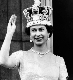 How was Queen Elizabeth II brought up?